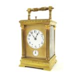 French repeater carriage clock with alarm striking on a gong, the 2.25" principal dial over an alarm