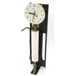 Interesting Gents of Leicester electric clock, the 8.25" cream metal dial over a cylindrical drum