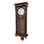 Walnut and ebonised double weight Vienna regulator wall clock, the 7" white dial with subsidiary