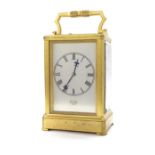 Fine English double fusee carriage clock striking on a gong, the silvered dial signed James