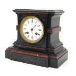 Small black slate and rouge marble two train mantel clock striking on a bell (missing), the 3.25"