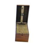 French walnut box metronome, labelled Metronome Paquet, Coffret, Brevet S.G.D.G