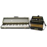 Interesting four octave dummy keyboard; together with a twenty-nine button melodeon (2)