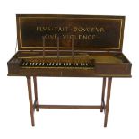 A small unfretted clavichord by Arnold Dolmetsch, Haslemere, 1922, the case of dark walnut with