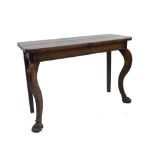 Antique oak console table, the moulded top with canted corners upon two broad cabriole front legs