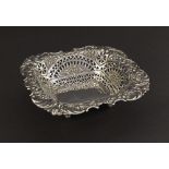 Late Victorian silver bonbon dish with raised fan pierced borders embossed with flowers and scrolled