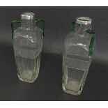 Attractive pair of faceted twin handled glass vases, with green glass handles, hobnail cut bands and