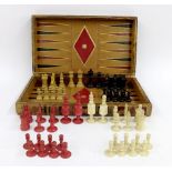 19th century bone chess set, height of king 10.5cm; together with a boxwood Staunton chess set,