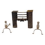 Pair of cast iron fire dogs; together with a cast iron fire grate (3)