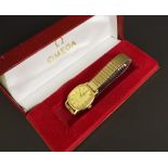 Omega De Ville gold plated lady's wiristwatch with an expanding bracelet, quartz, 22mm; Omega box