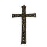 Cast bronze study of Christ on the cross, the crucifix pierced with scrolled foliage, 12" long