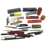 Selection of assorted fountain pens and related items