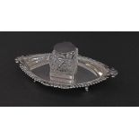 Edwardian silver standish fitted with a hobnail cut glass inkwell upon an oval tray with gadrooned