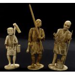 Three Japanese sectional ivory okimono depicting men in various pursuits (all a.f) (3)