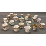 Collection of twenty assorted porcelain coffee cans, principally English early 19th century (20)