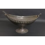 Large silver plated oval fruit bowl cast with twin maiden heads, the rim pierced with hearts over