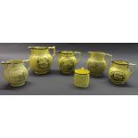 Five various early 19th century canary yellow silver resist lustre jugs with bat printed decoration;