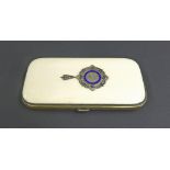 19th century ivory purse, the top applied with silver and enamel motif enclosing a fitted