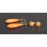 Pair of coral pear shaped drop earrings, 42mm; also a pair of coral ear studs (4)