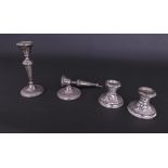 Four various silver candlesticks (a.f) (4)