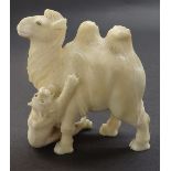 Japanese ivory okimono modelled as a tiger attacking a camel, 3.5" high