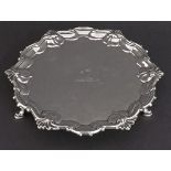 George II silver waiter, the raised rim cast with shell and scrolled cartouche, the bowl engraved