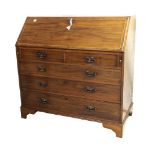 Attractive early 19th century mahogany bureau, the fall-front enclosing a flame mahogany and boxwood