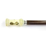 Interesting antique gaming stick, the ivory knop in the form of a shaker with dice, with silver