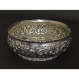 Silver pedestal fruit bowl chased with flowers and scrolled acanthus, stamped Nowlan & Co to base,