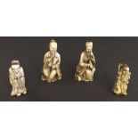 Two similar Japanese carved ivory netsuke in the form of bearded gentlemen, 2.5" and 2" high