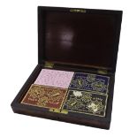 19th century burr walnut Bezique games box, inset with playing cards and markers branded De La Rue &