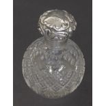 Late Victorian cut glass and silver topped spherical scent bottle, the screw top encasing a cork