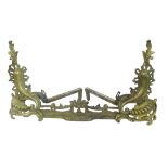 Rococo style brass chenet, 52" wide