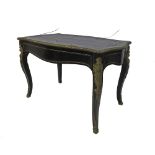 19th century French ebonised bureau plat, with brass inlay and ormolu mounts, the serpentine top