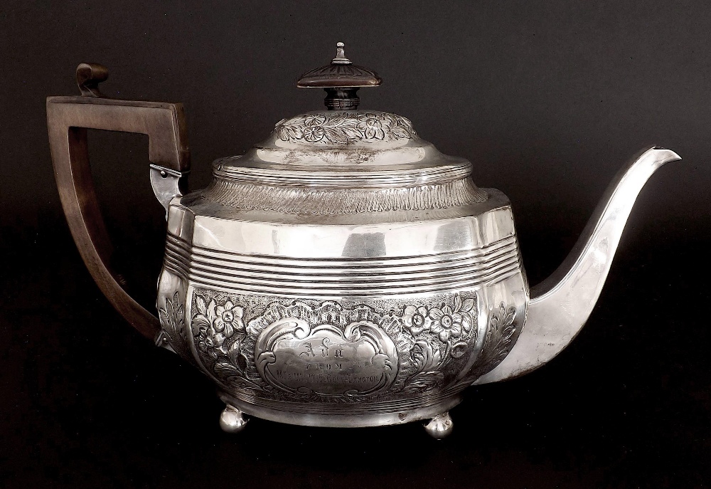 George III silver serpentine teapot with later Victorian chasing of flowers and acanthus, with