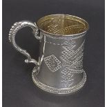 Victorian silver christening mug with engraved beaded and floral decoration and gilded interior,