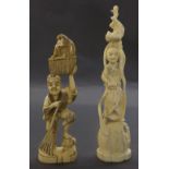 Japanese stained ivory okimono modelled as a man holding a broom with a monkey in a basket upon