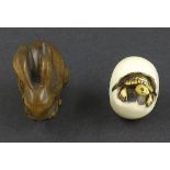 Japanese ivory netsuke of a turtle in an egg, 1.5" long; also a carved netsuke of a rabbit, 1.5"