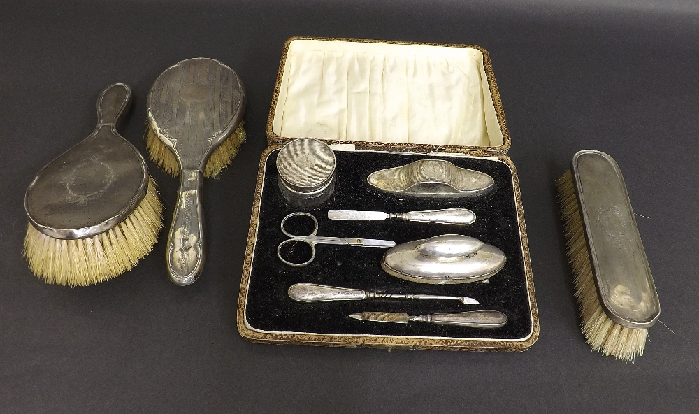 Vintage cased silver vanity set with manicure items etc; together with three silver dressing