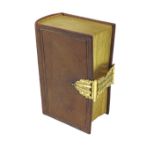 Antique leather bound bible fitted with a rose gold clasp, the book 5.25" long