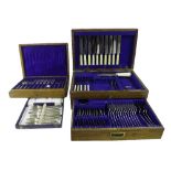 Part two tier oak canteen of silver plated cutlery with recessed front handle on the drawer, 18"