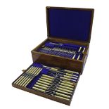 Good oak twin campaign handled canteen of silver plated cutlery by Harrison Brothers & Howson fitted