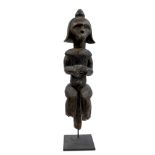Fang Gabon Bieri Bone Guardian carved wooden figure, upon a cast metal stand, the figure 24" high