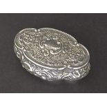 Edwardian silver serpentine embossed trinket dish, decorated with scrolled foliage, maker marks