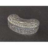 Edwardian silver kidney shaped ring box, embossed with scrolled foliage, maker William Aitken,