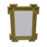 Interesting giltwood and gesso rectangular wall mirror with crossed corners embossed with shells and