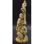 Japanese ivory okimono modelled with three figures, Meiji period, 9" high