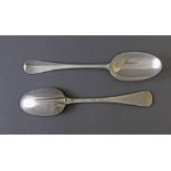 Pair of George II Britannia silver rat tail tablespoons, maker marks rubbed, London 1729 (possibly