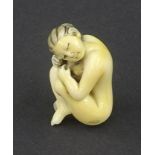 Japanese ivory netsuke modelled as a nude female, signed, 1.75" high