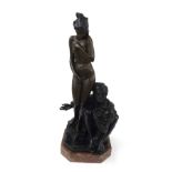 Bronze study of a nude female with an Arabic type gentleman at her feet, upon a red veined marble